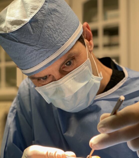 Dr. Ryan Marshall working in a surgery